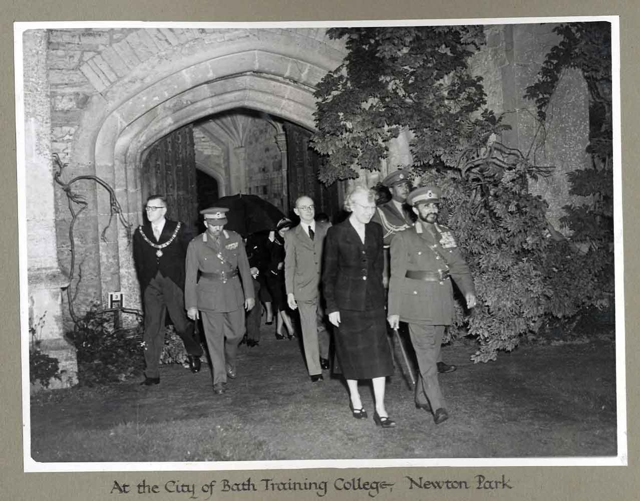 Old photograph of people in coats at Newton Park, including Emperor Haile Selassie