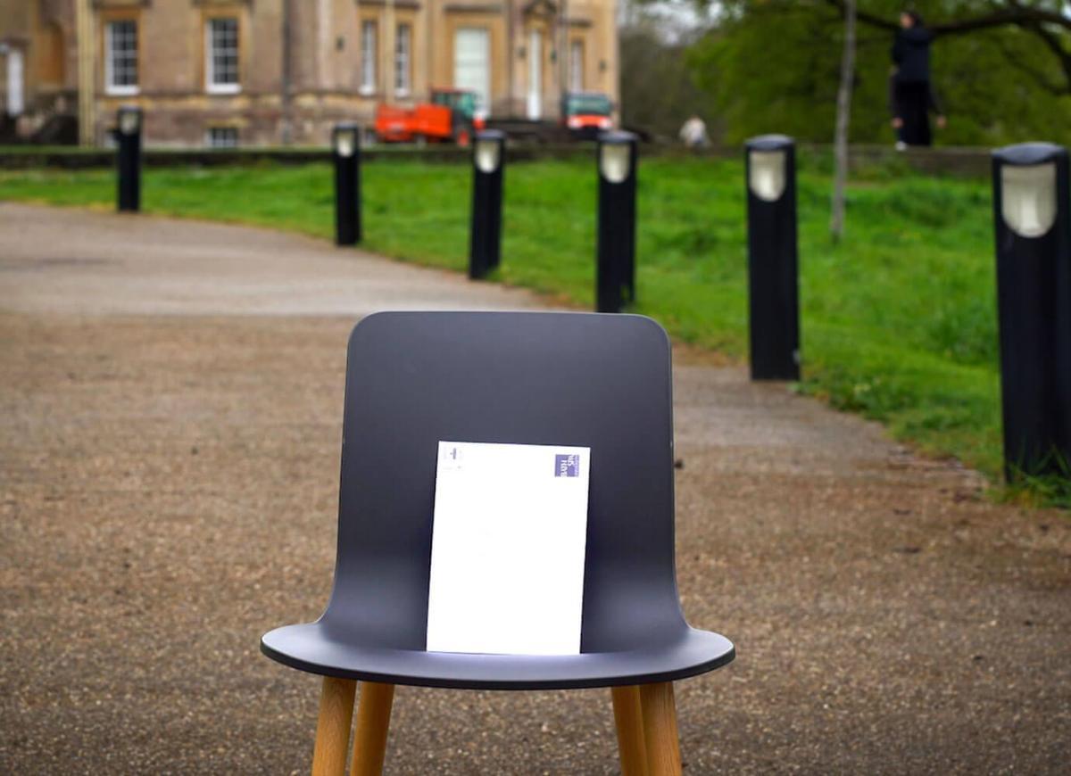 A chair with an envelope on it at Newton Park campus