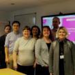 A group of people in front of British Heart Foundation logo