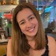 Smiling young woman in a cafe