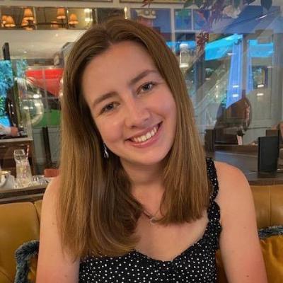 Smiling young woman in a cafe