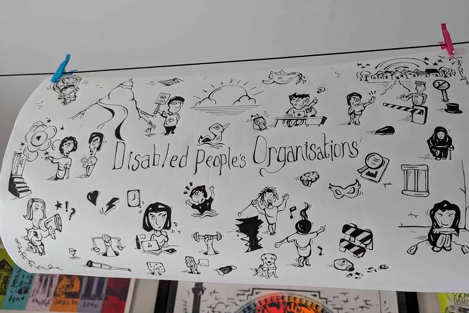 Close up of DPO mural drying on a line