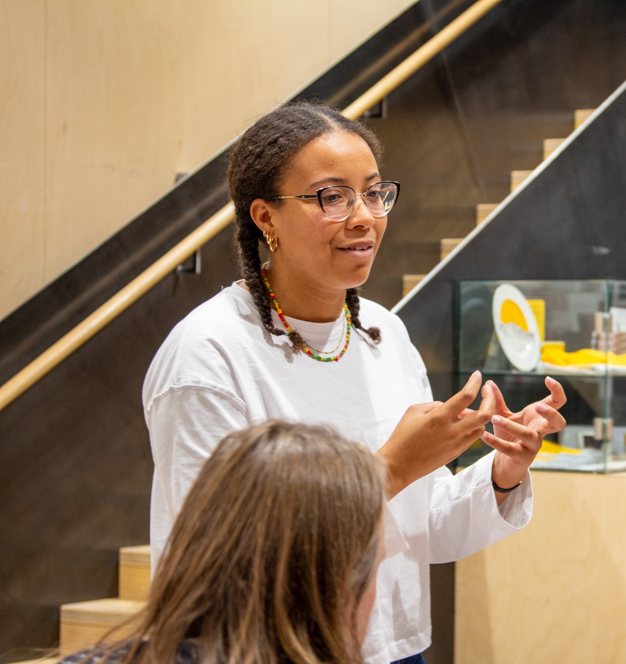 A photo of a person with two short braids at Locksbrook Campus