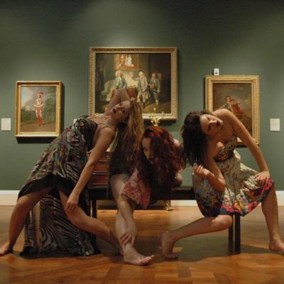 Performers in an art gallery