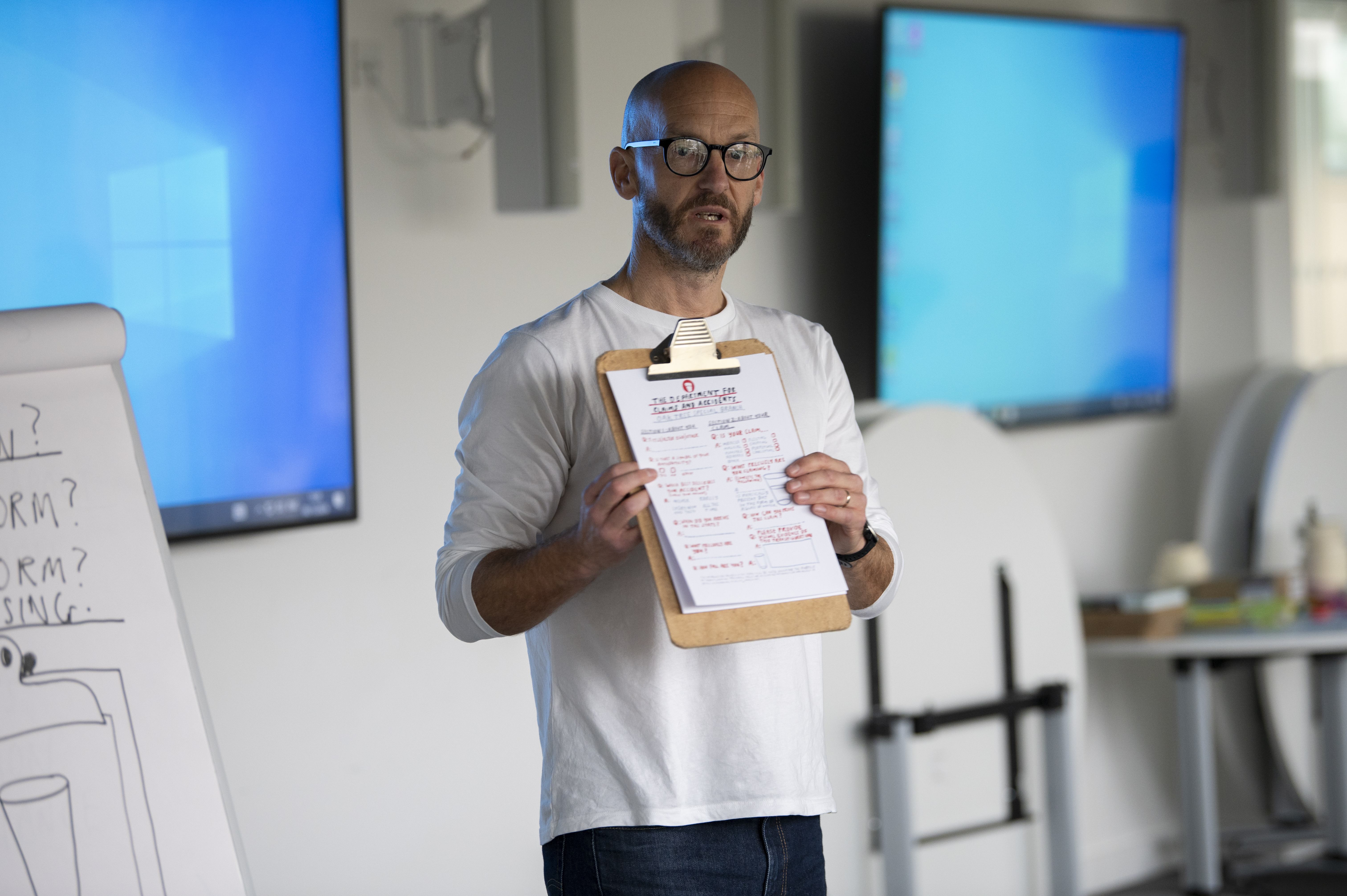 A person holding a clipboard