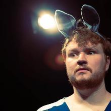 Head shot of Charlie Day wearing bunny ears