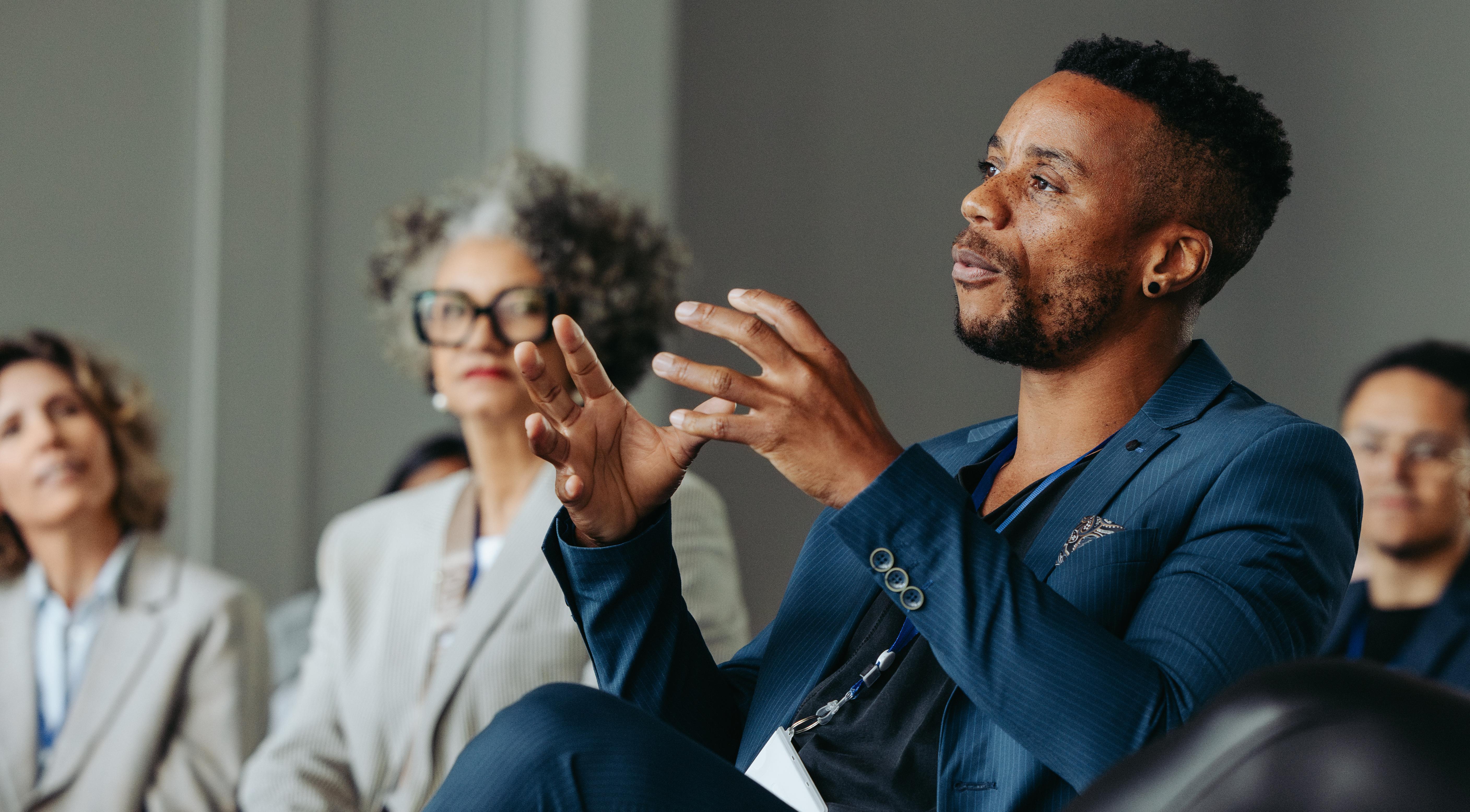 A discussion taking place in a seminar room