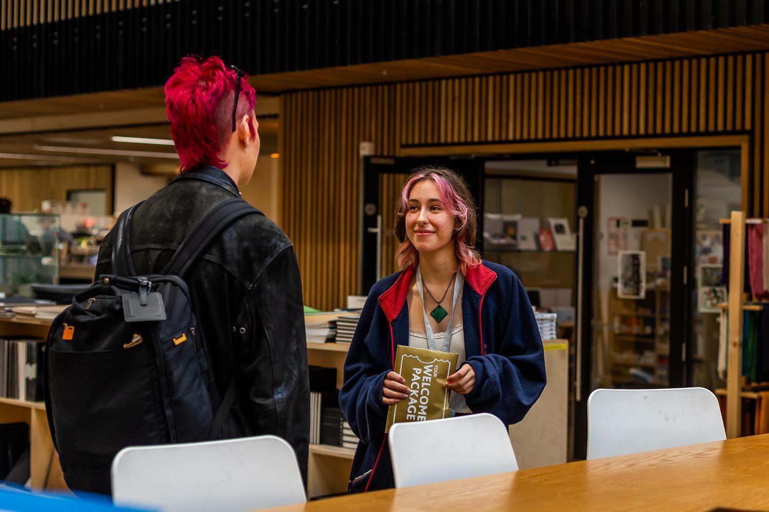 Two students standing outside the Locksbrook Art Shop