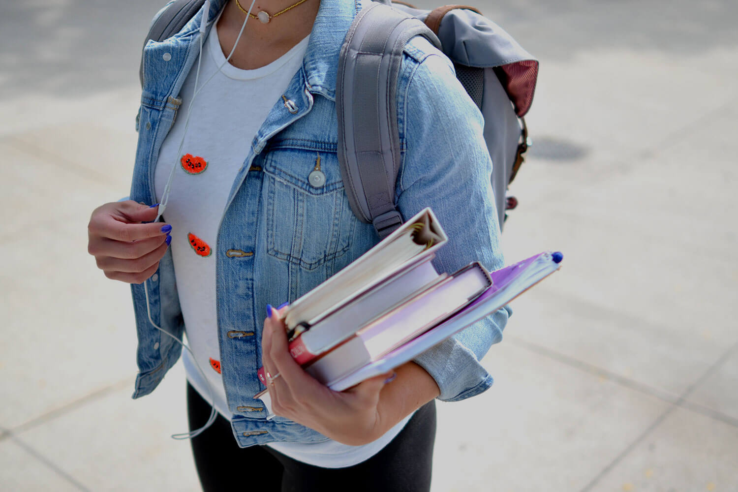 Student carrying several books