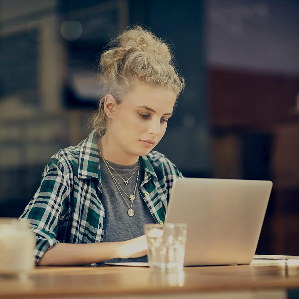 Student working on a laptop