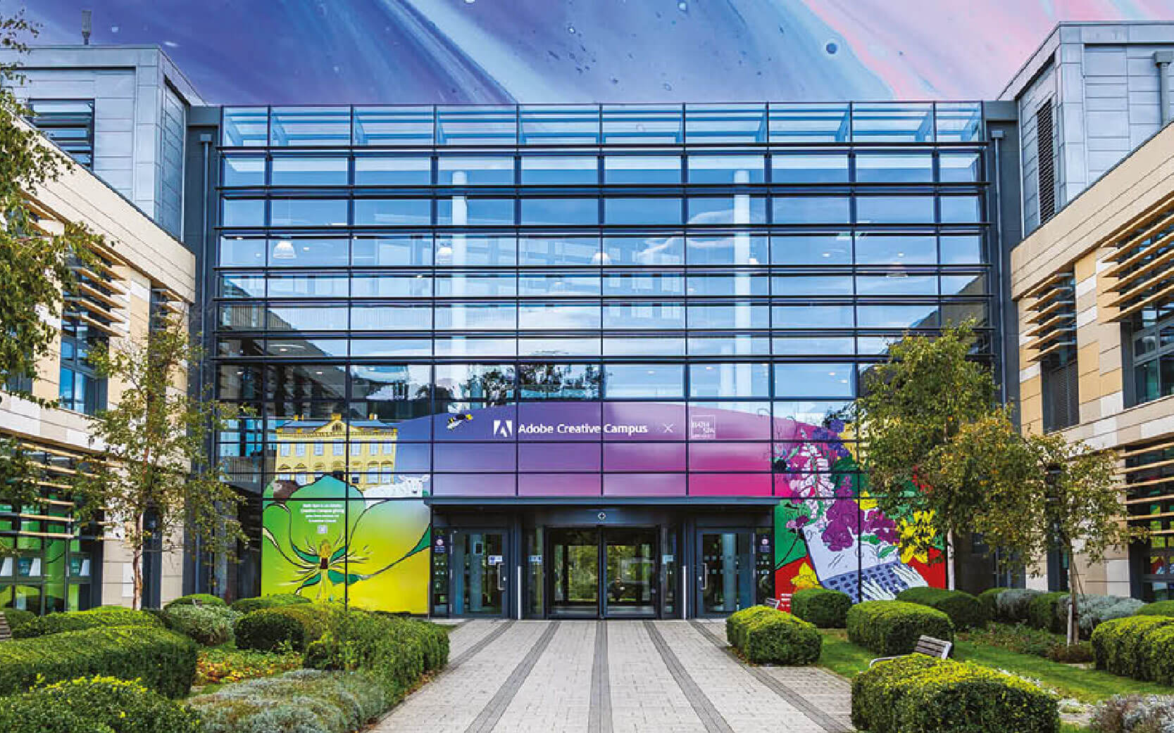 Glass fronted building with creative vinyl artwork applied to the windows