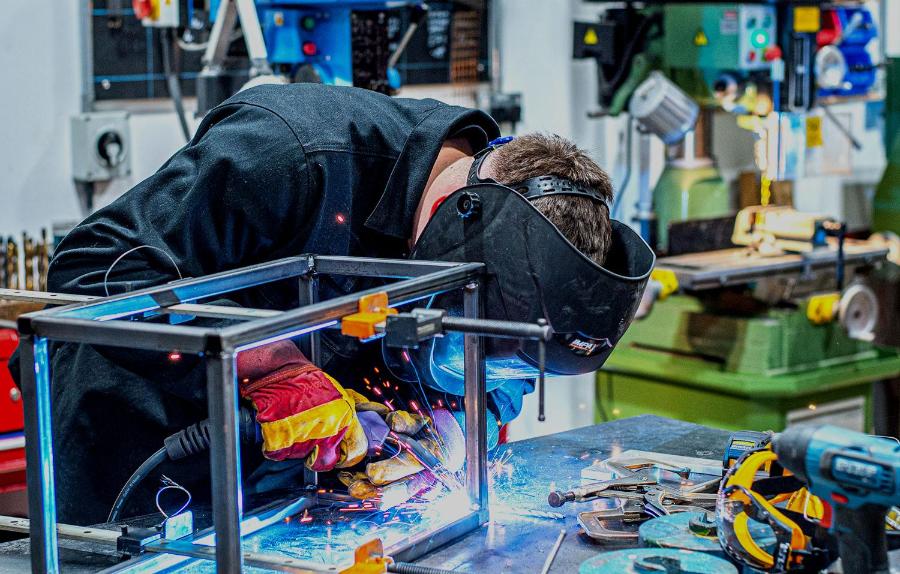 A picture of a student doing some metalwork in Locksbrook Building