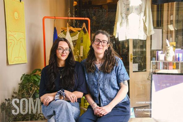 Two women sat together at the Somer store